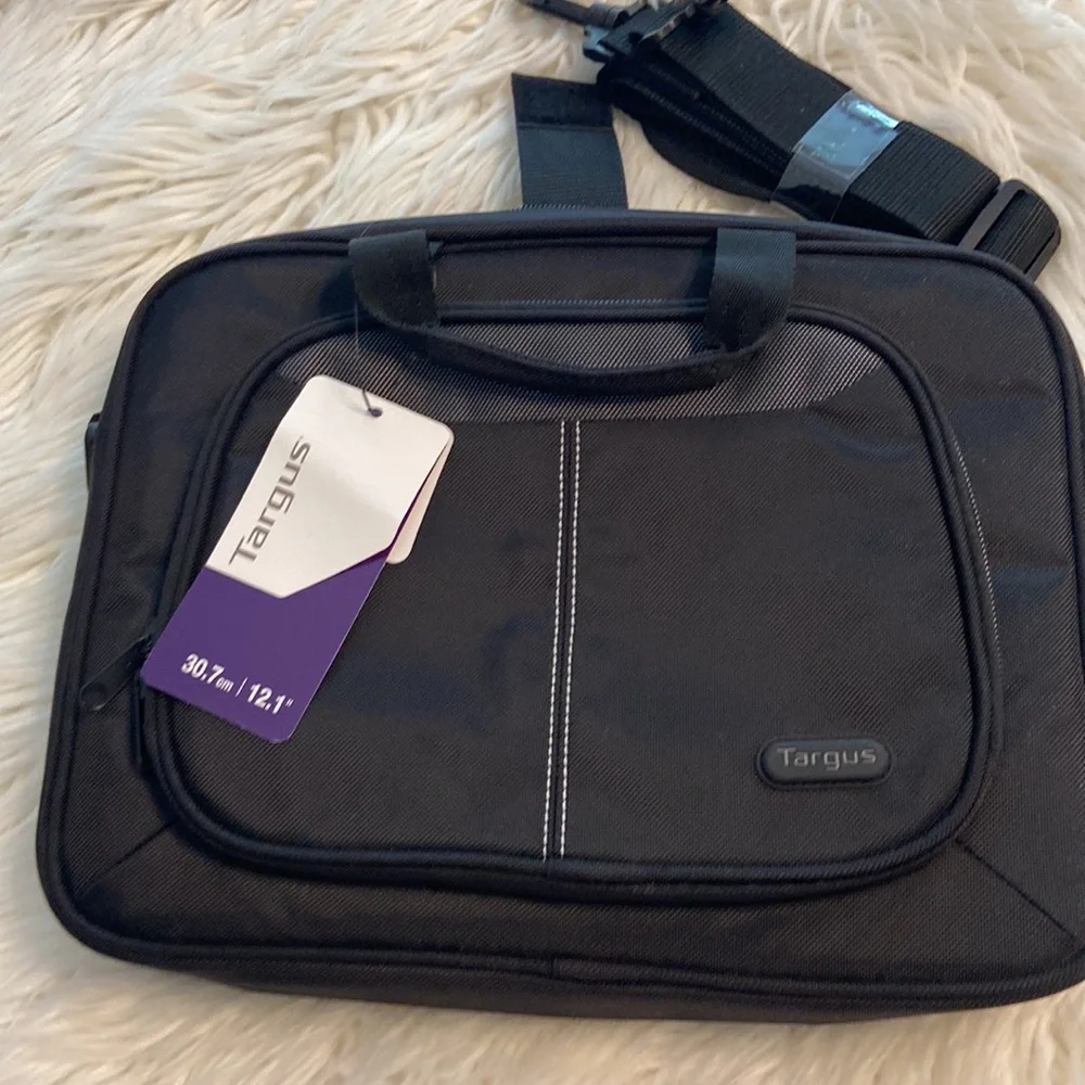 TARGUS Laptop bag color black brand new with tag see all photos